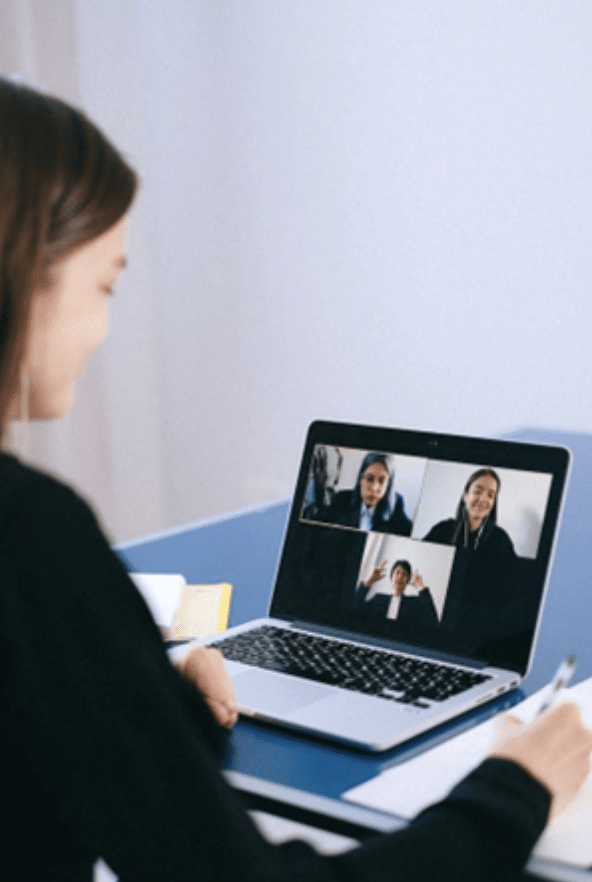 Hiring Remote Workers in Mexico: Expert Solutions. photograph of a woman on video call on a laptop